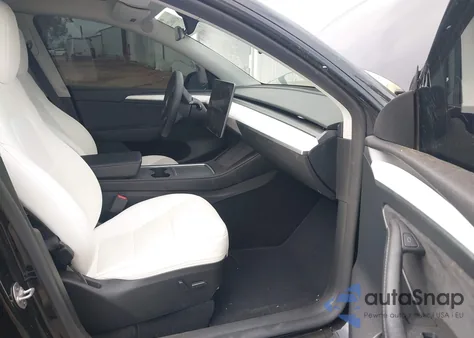 2023 Tesla Model Y from USA, damaged, VIN 7SAYGDEE9PF868233